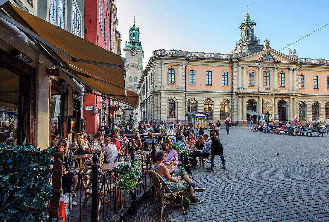 Cafes and restaurants in the main square Stortorget in the old town Gamla Stan. Nobel museum in the background., Stockholm, Sweden