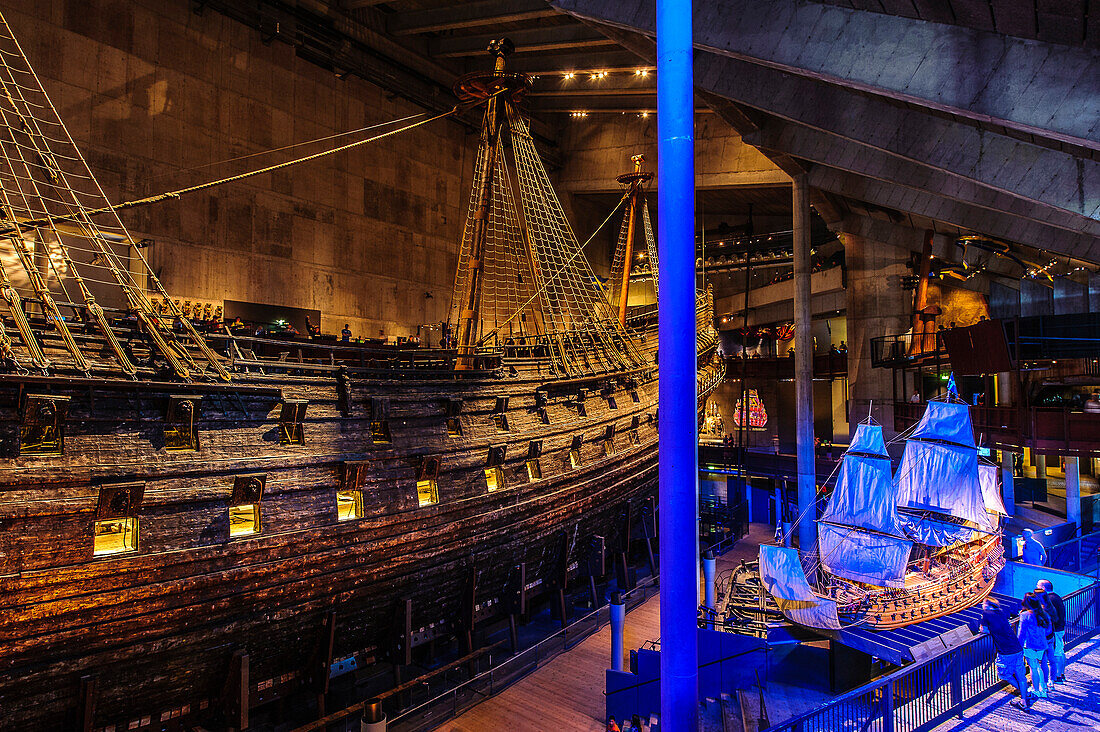 Model of the Vasa next to the original in the Vasa Museum, Stockholm, Sweden