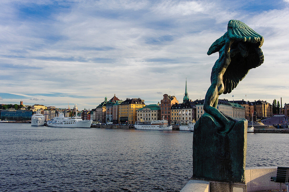 View of old town with sculpture in the foreground, Stockholm, Sweden
