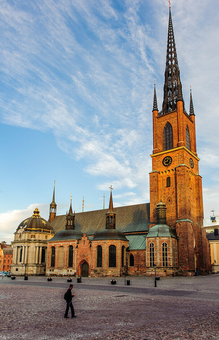 Pedestrians in front of church Riddarholmskyrkan, Stockholm, Sweden