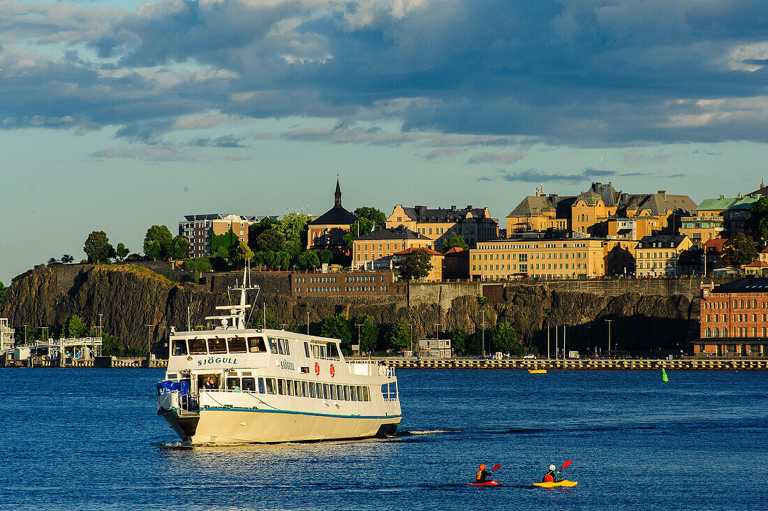 View of Soedermalm, kayaks in the foreground, Stockholm, Sweden