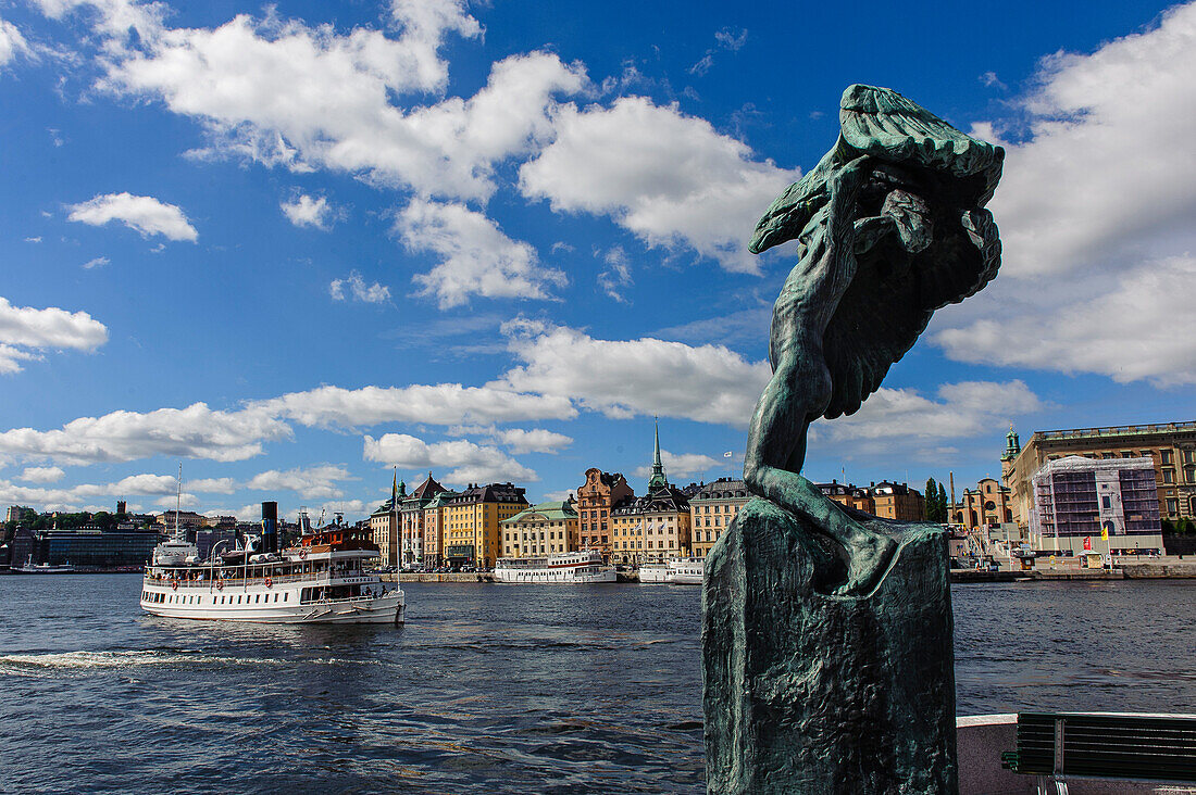 View of old town with sculpture in the foreground, Stockholm, Sweden