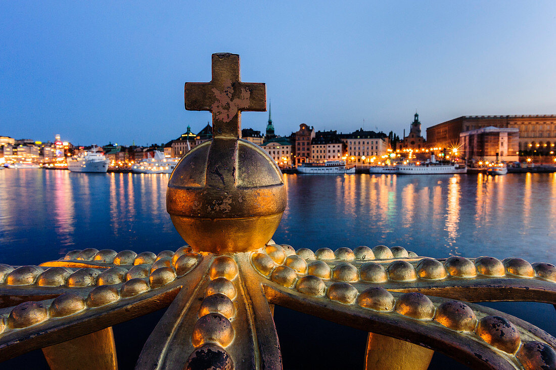 View from the Skeppsholmsbron with crown on the railing on old town, Stockholm, Sweden