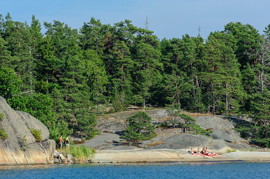 Sunbathing in the Scharengarten Fiskhamn Island, Stockholm, Sweden