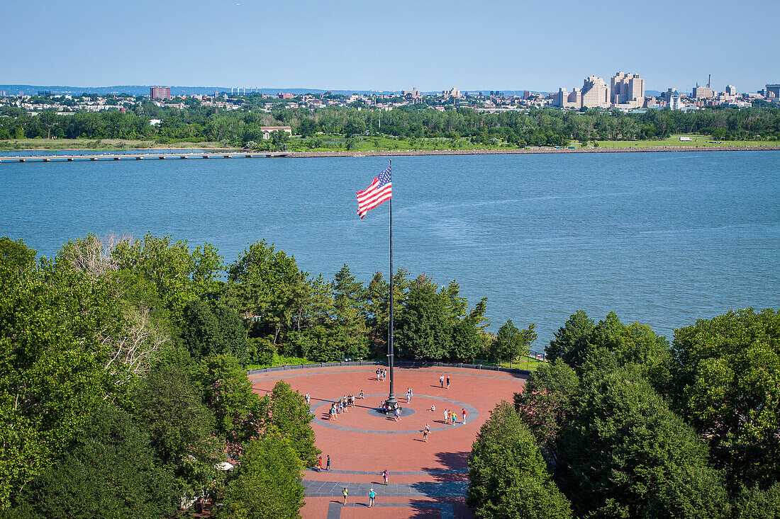 view of the main square on liberty island and an american flag seen from the top of the statue of liberty's pedestal, new york harbor, new york city, state of new york, united states, usa