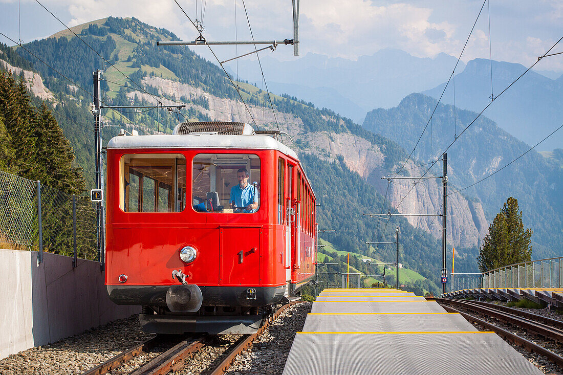 funicular coming into the station of rigi kaltbad, lake lucerne region, canton of lucerne, switzerland