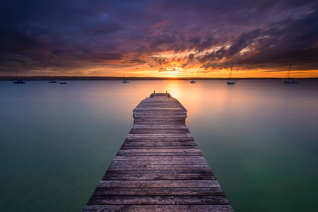 dramatic sunset after a storm, lake Ammersee, Bavaria, Germany