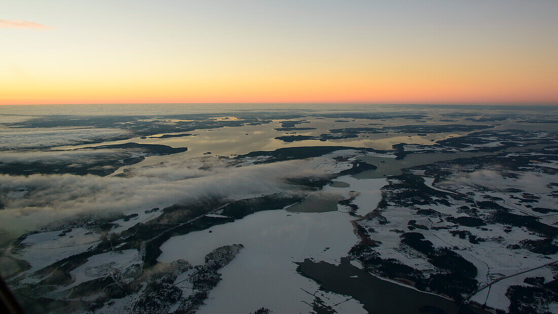 dawn at the southern coast of Finland taken from the cockpit