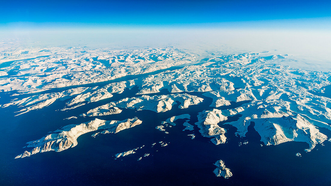 Snow and ice on the islands at the eastcoast of Greenland