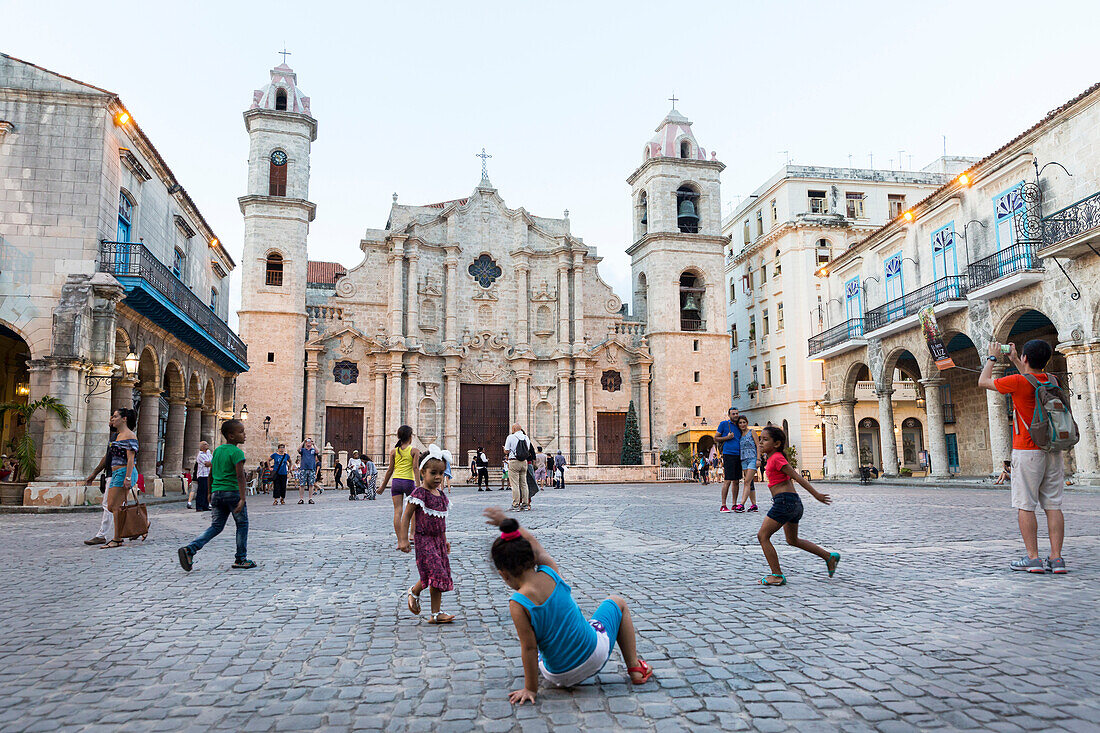 Cathedral at Havana Vieja, Plaza de la Cathedrale, children playing football on the square, historic town, center, old town, Habana Vieja,  family travel to Cuba, parental leave, holiday, time-out, adventure, Havana, Cuba, Caribbean island