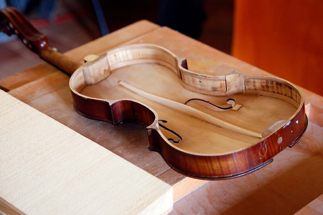 Crafts. Artisan luthier. Close-up on a violin being made.