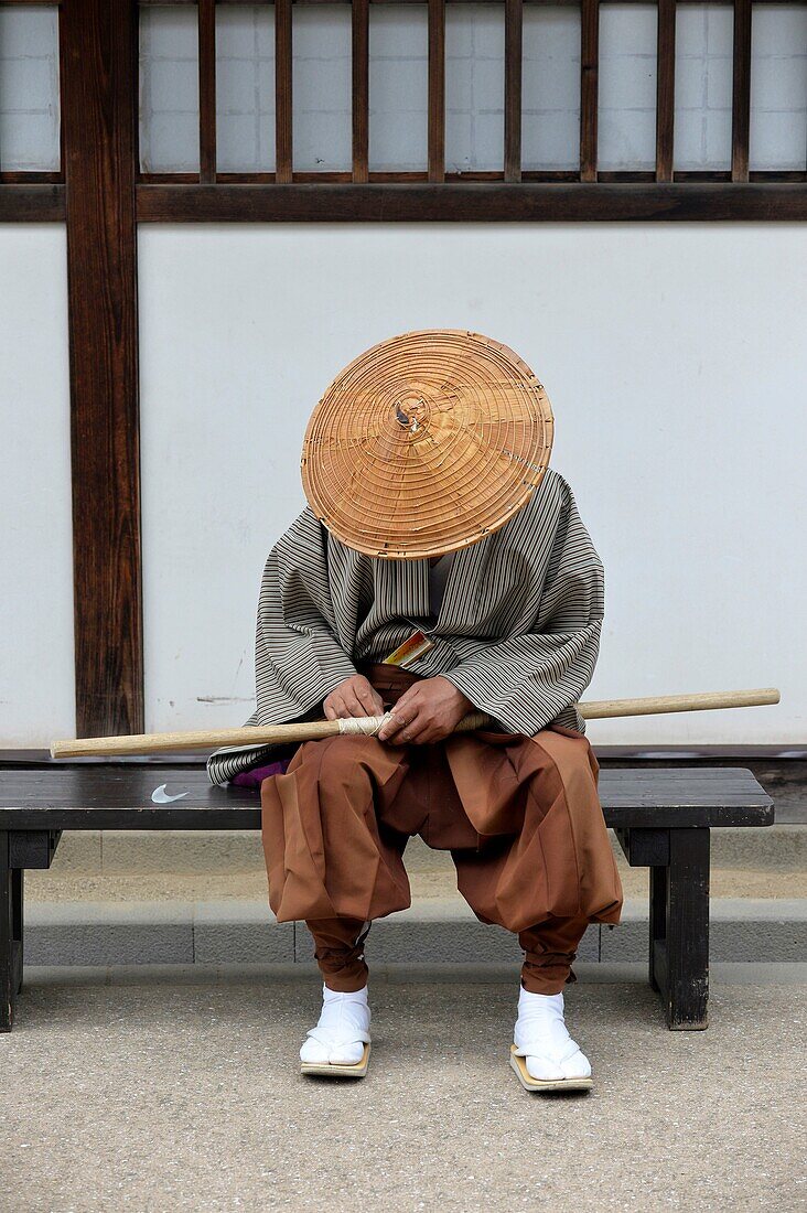 Traditionally dressed man in Dejima in the port of Nagasaki, Kyushu, Japan, Asia
