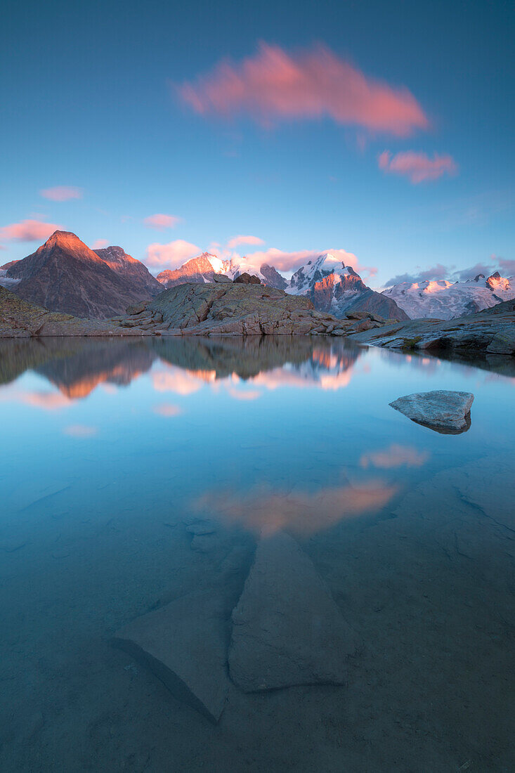 Pink clouds at sunset on Piz Bernina, Fuorcla Surlej, Corvatsch, Engadine, Canton of Graubunden, Swiss Alps, Switzerland, Europe