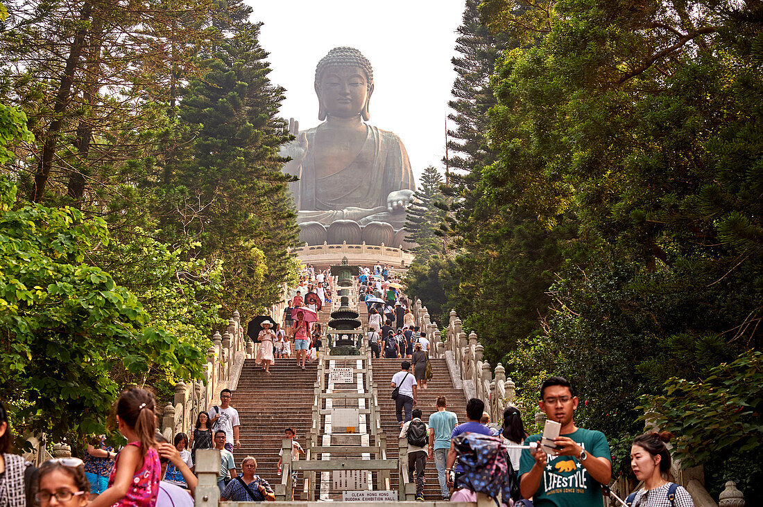 Visitors make the climb to see Big Buddha, Po Lin Monastery, Ngong Ping, Lantau Island, Hong Kong, China, Asia