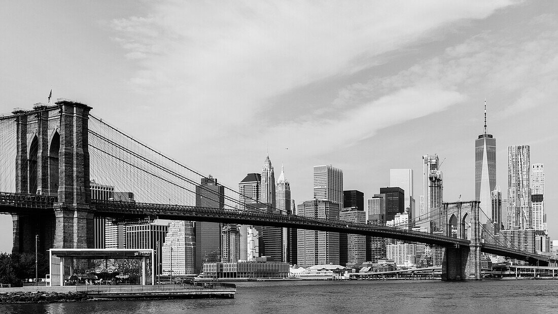 Brooklyn Bridge Over East River in Manhattan against sky, New York City, New York, USA