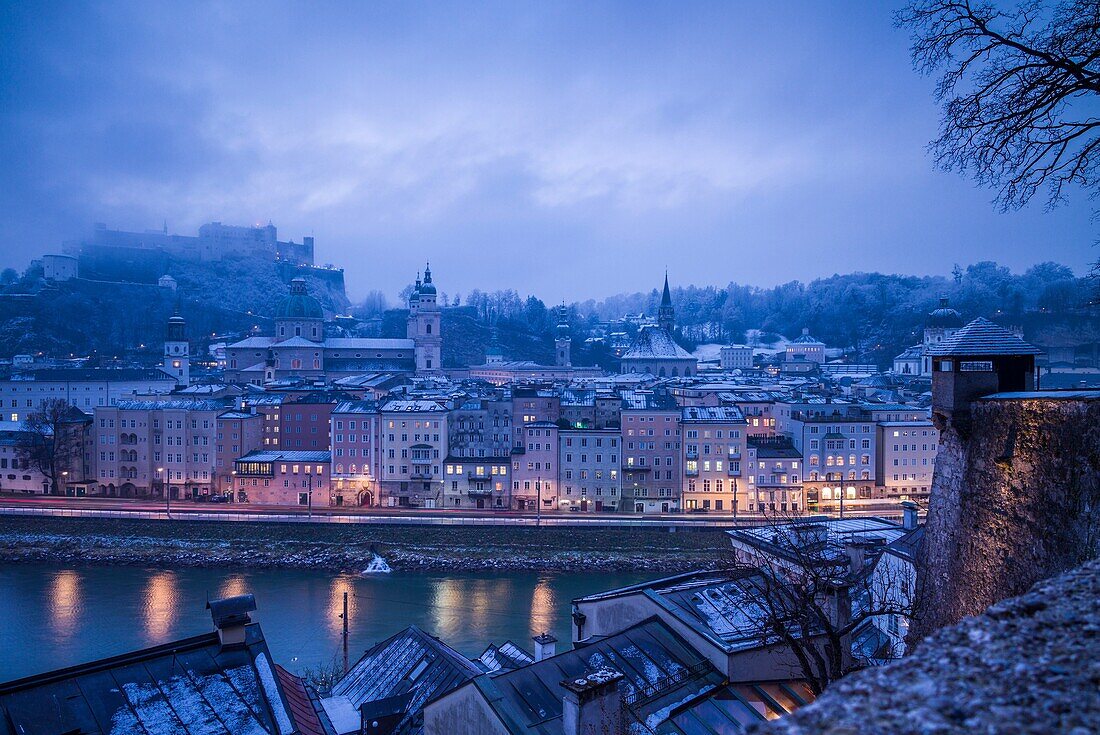 Austria, Salzburgerland, Salzburg, elevated city view from the kapuzinerberg, dawn, winter.