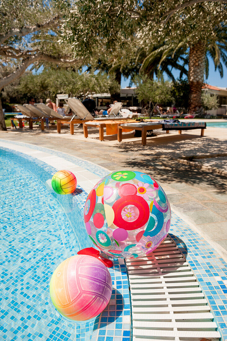beach ball in the hotel pool, garden, Agia Galini, Crete, Greece, Europe