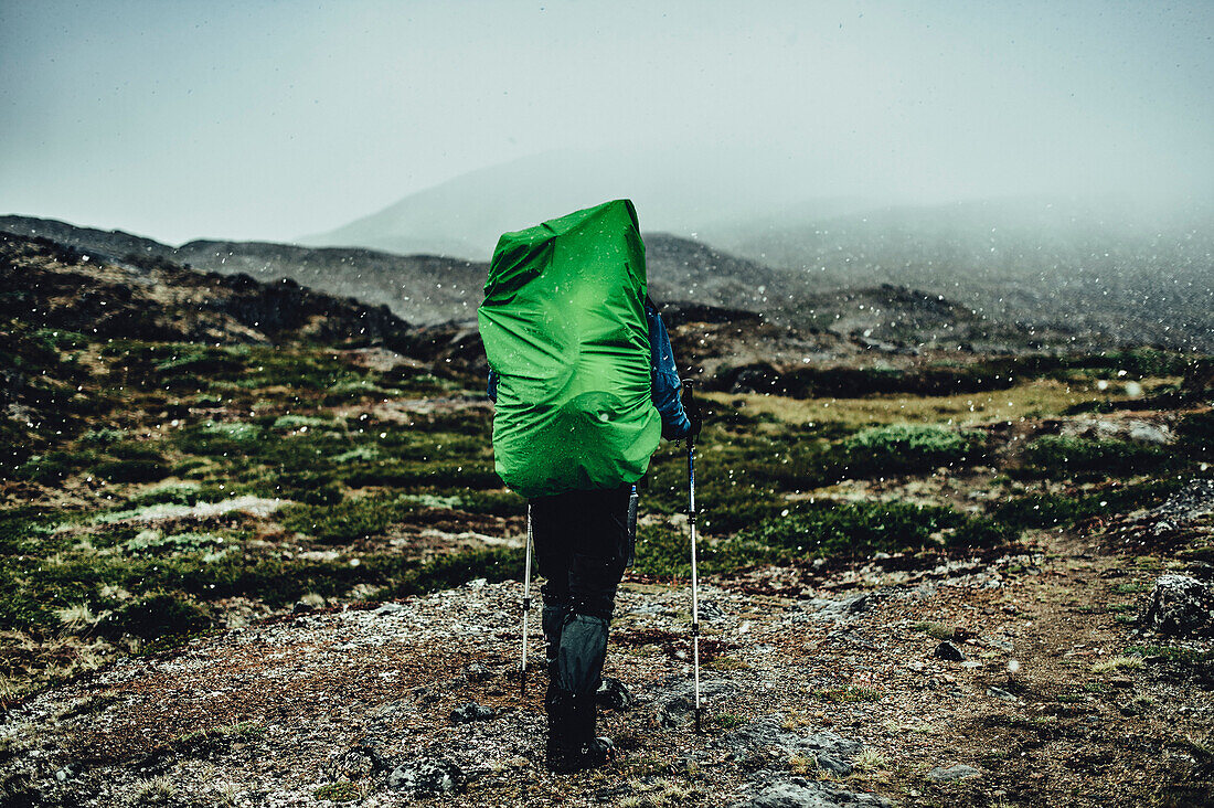 Hiker on a route through greenland, greenland, arctic.