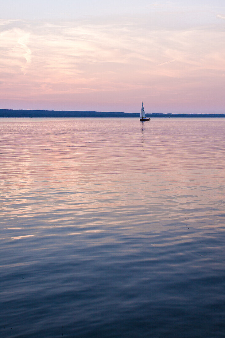 Lonely Yacht at the Sunset at the Ammersee lake