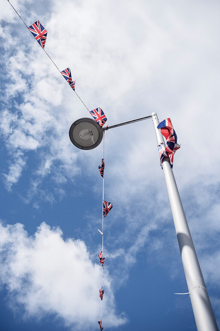 street light with attached UK flags, Belfast, Northern Ireland, United Kingdom, Europe