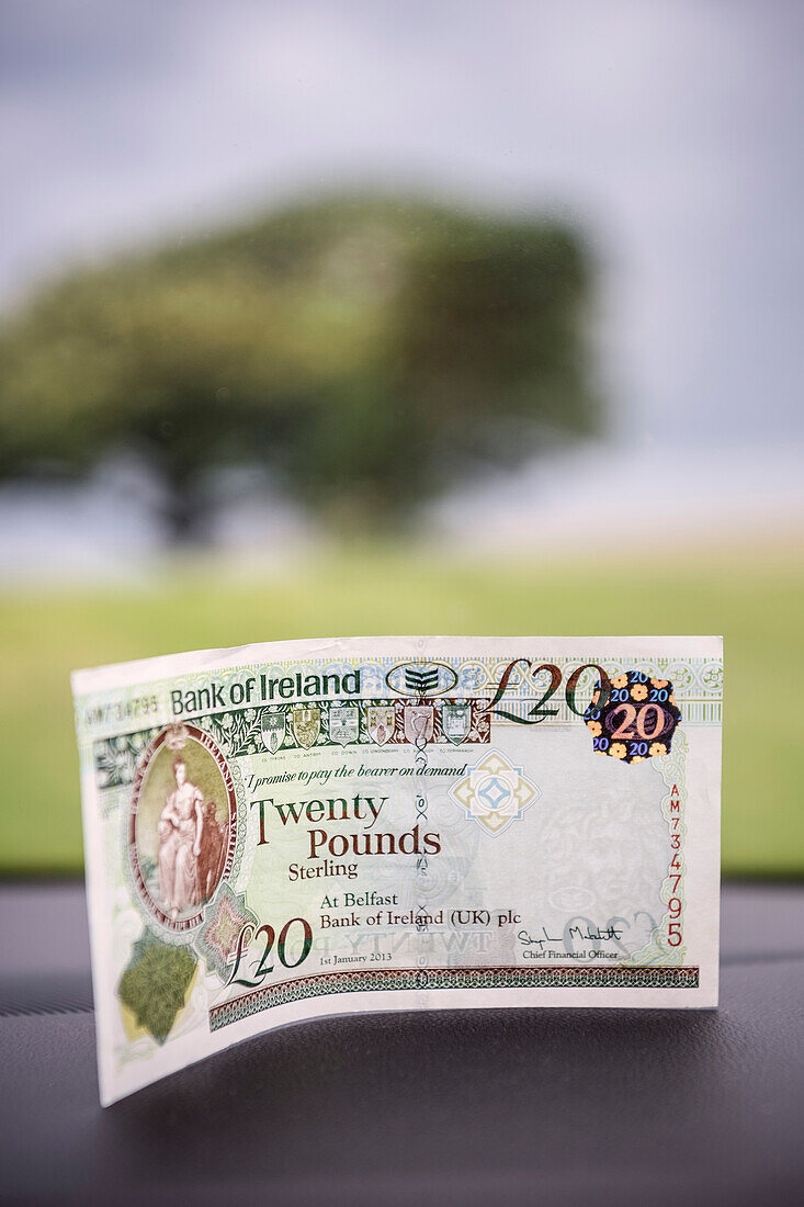 twenty pound banknote in car afer border crossing, Northern Ireland, United Kingdom, Europe