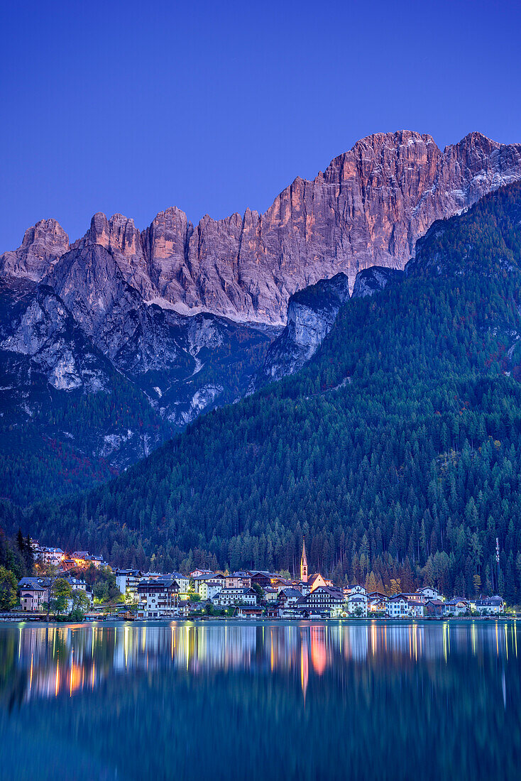 Alleghe and Civetta reflecting at night in lake Lago di Alleghe, Lago di Alleghe, Dolomites, UNESCO World Heritage Site Dolomites, Venetia, Italy