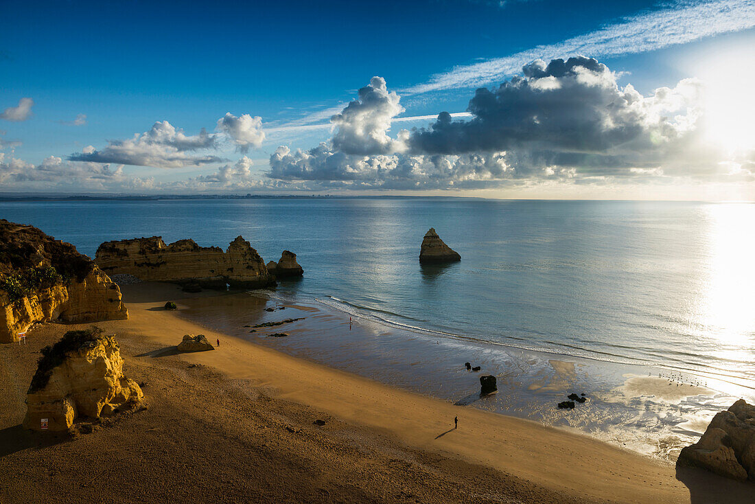 Coloured cliffs and sunrise at the beach, Praia da Dona Ana, Lagos, Algarve, Portugal