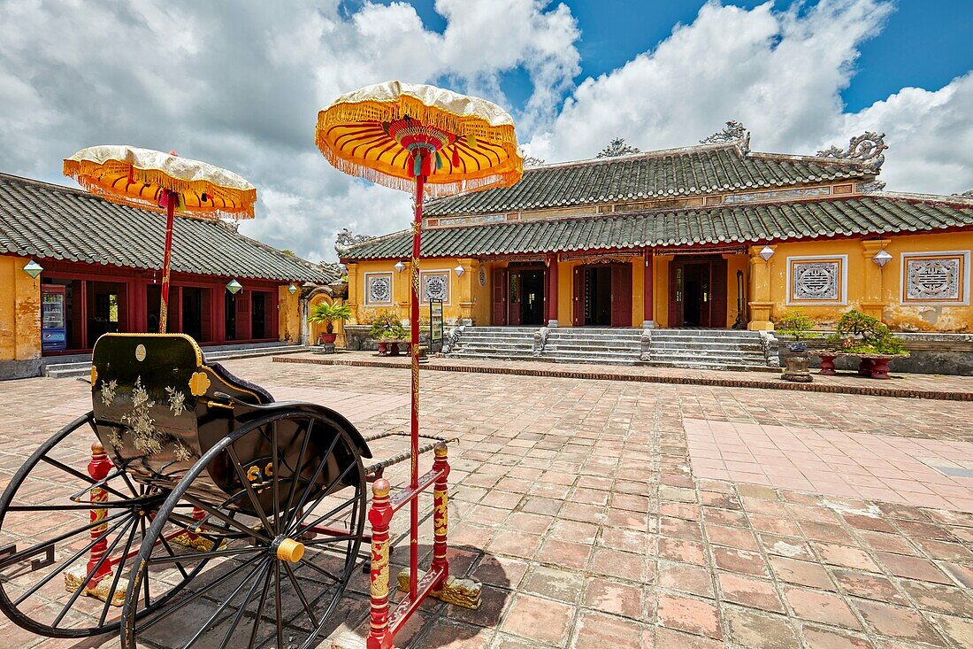 Traditional rickshaw carriage at Truong Sanh Palace. Imperial City (The Citadel), Hue, Vietnam.