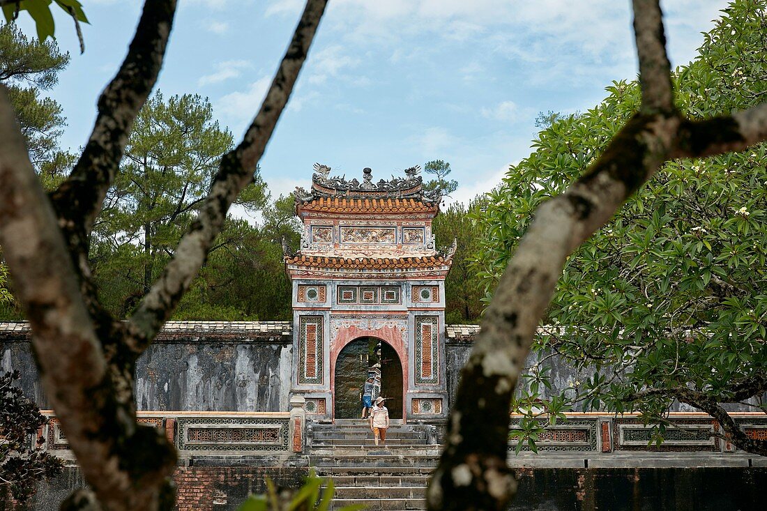 View of The Precious Wall (Buu Thanh) and entrance gate to the Royal Crypt (Huyen Cung). Tomb of Tu Duc, Hue, Vietnam.