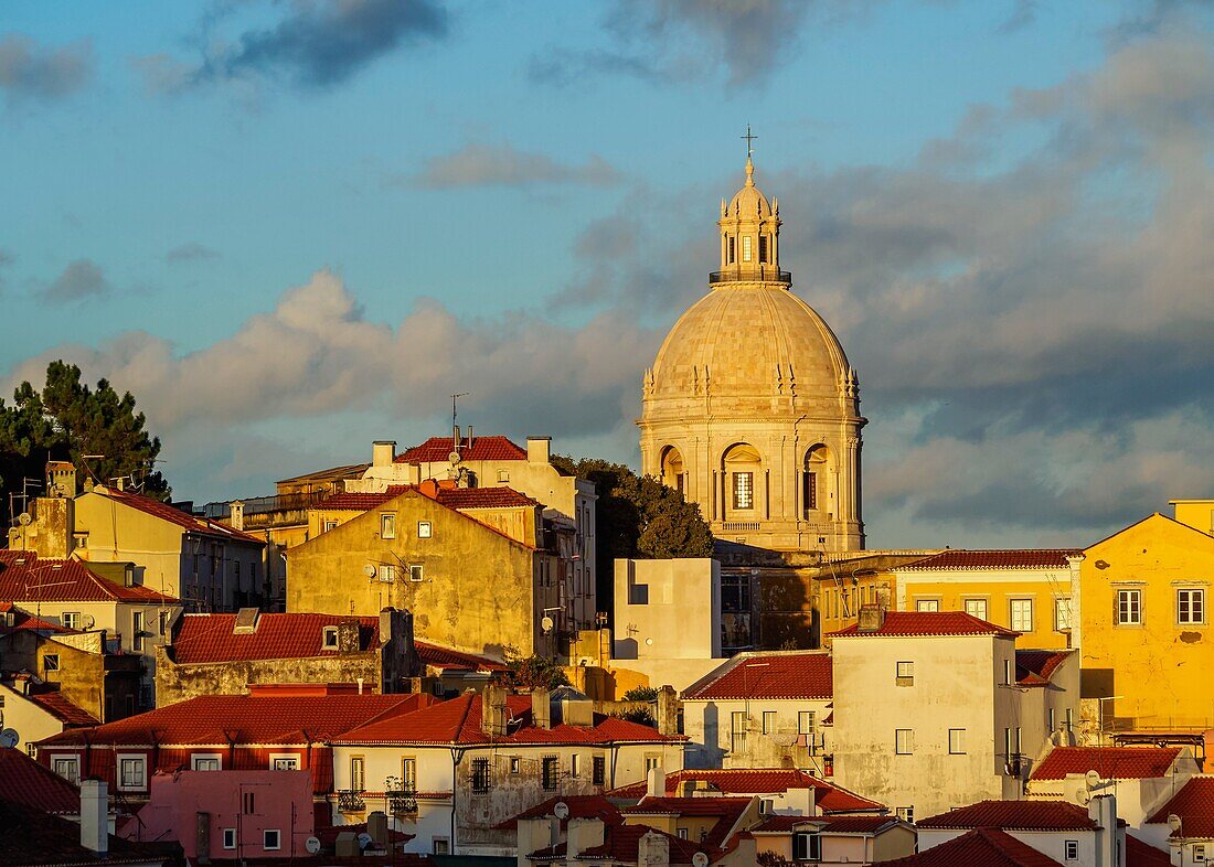 Portugal, Lisbon, Miradouro das Portas do Sol, View over Alfama Neighbourhood towards the National Pantheon at sunset.
