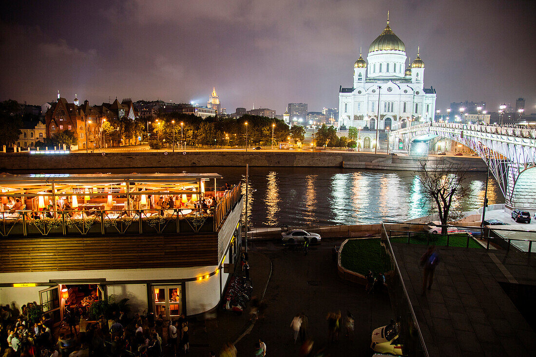 RUSSIA, Moscow. RUSSIA, Moscow. Night view of Bar Strelka and the Cathedral of Christ the Saviour located by the Moscow River.