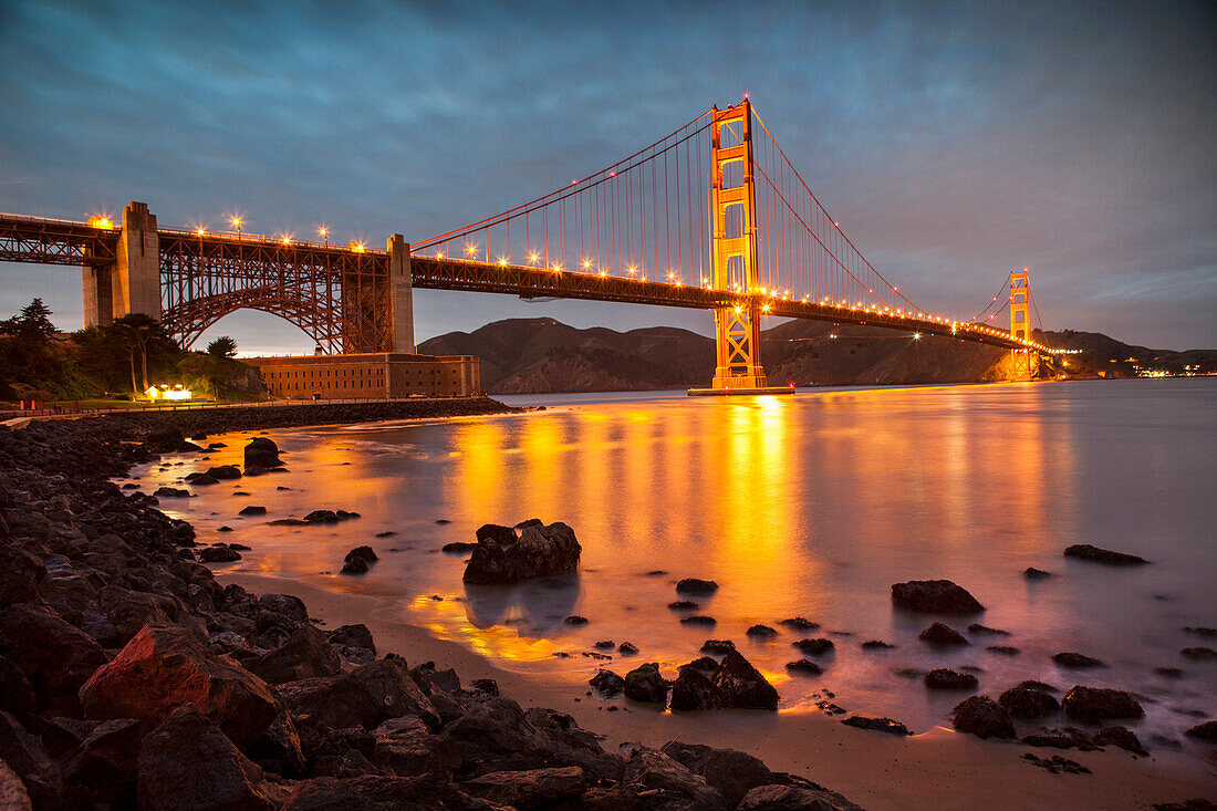 USA, California, San Francisco, NOPA, Fort Point, Chrissy Fields, The Golden Gate Bridge at dusk looking towards the Marin Headlands