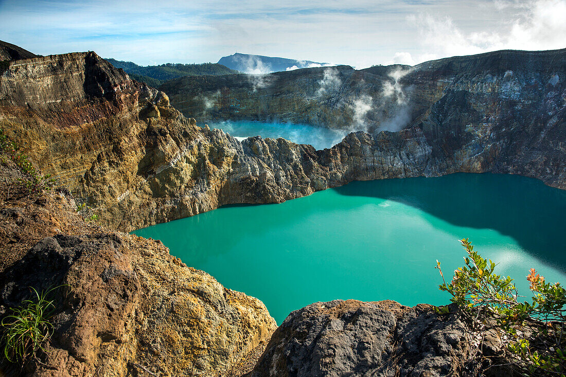 INDONESIA, Flores, the highest viewpoint in Kelimutu National Park and volcano, with views of Tiwu Nuwa Muri Koo Fai and Tiwu Ata Polo volcanic lakes