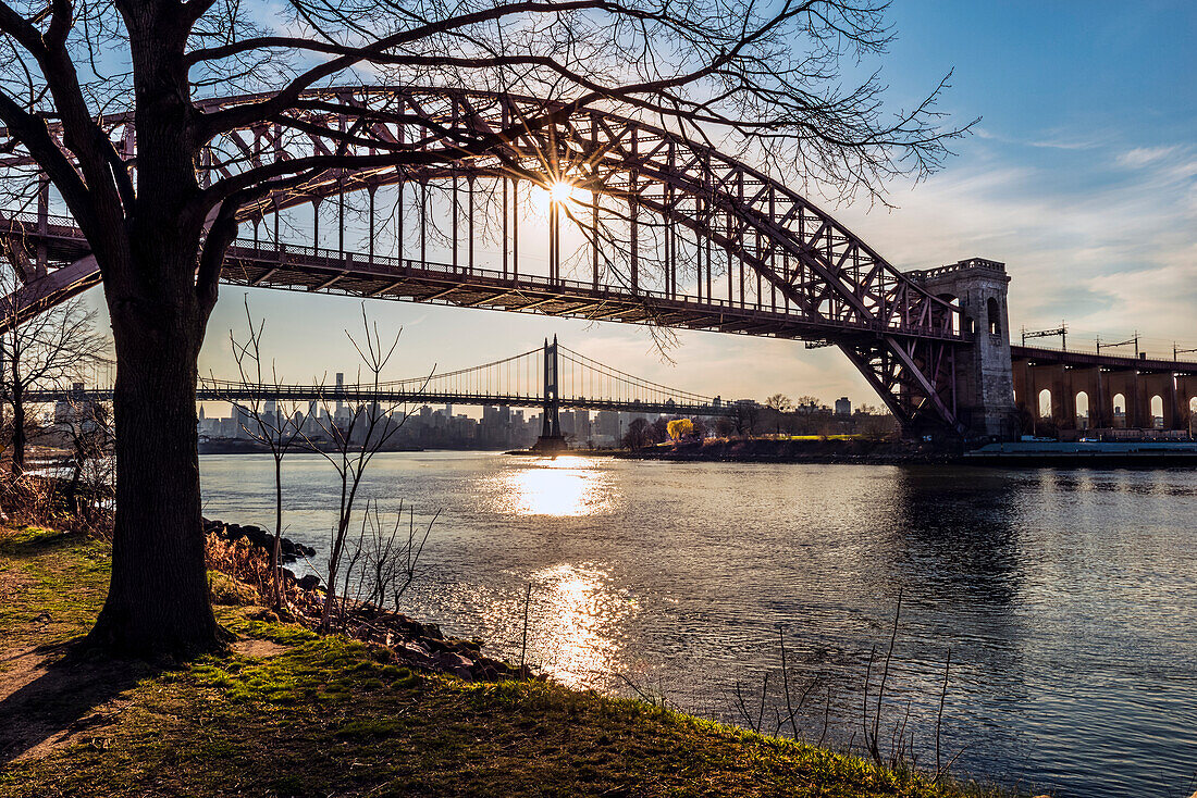 Hell Gate And Rfk Triboro Bridges At Sunset From Ralph Demarco Park; Queens, New York, United States Of America
