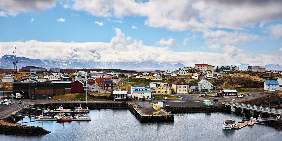 Colourful Houses And Small Boats In A Harbour, Snaefellsnes Peninsula; Iceland
