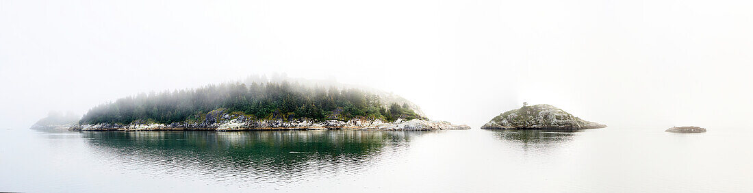 Trees On A Small Island In The Fog, Inside Passage; British Columbia, Canada