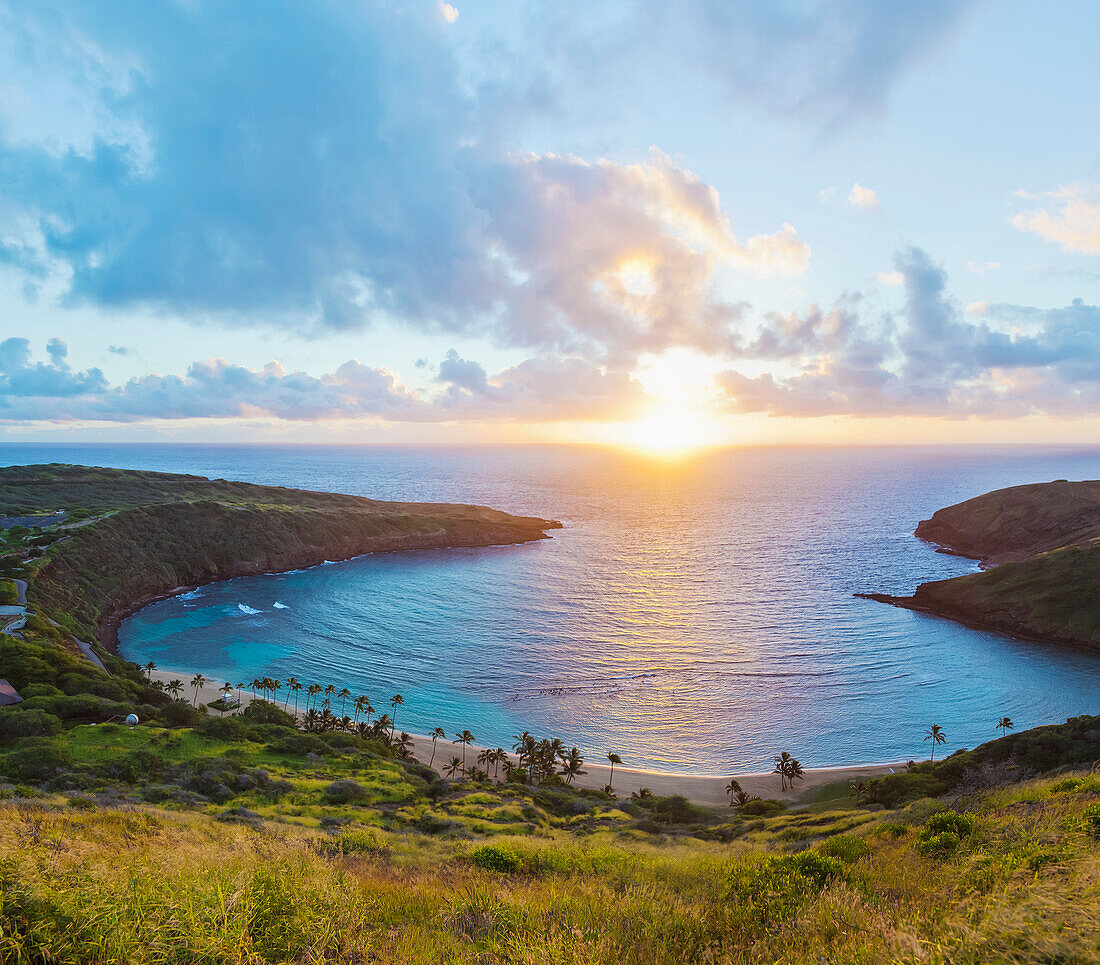 View of Hanauma Bay Nature Preserve at sunrise from the top of the ridge, East Honolulu; Honolulu, Oahu, Hawaii, United States of America