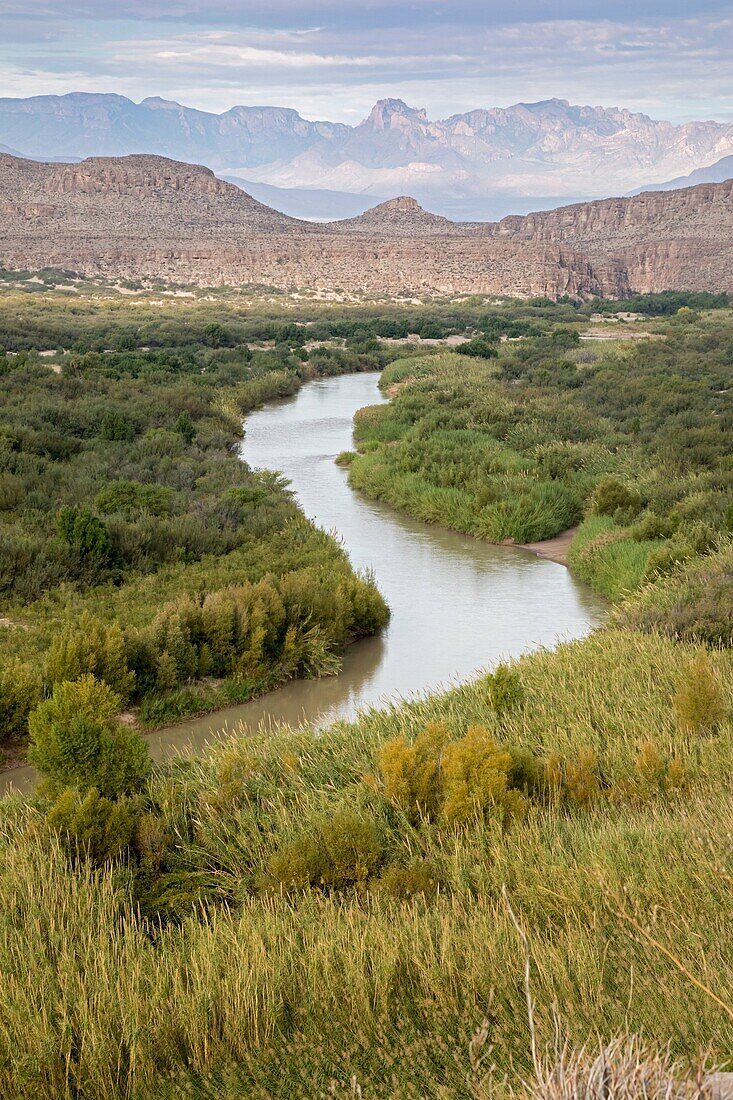 Big Bend National Park, Texas - The Rio Grande (Rio Bravo del Norte), the international border between the United States and Mexico. The Chisos Mountains are in the distance.