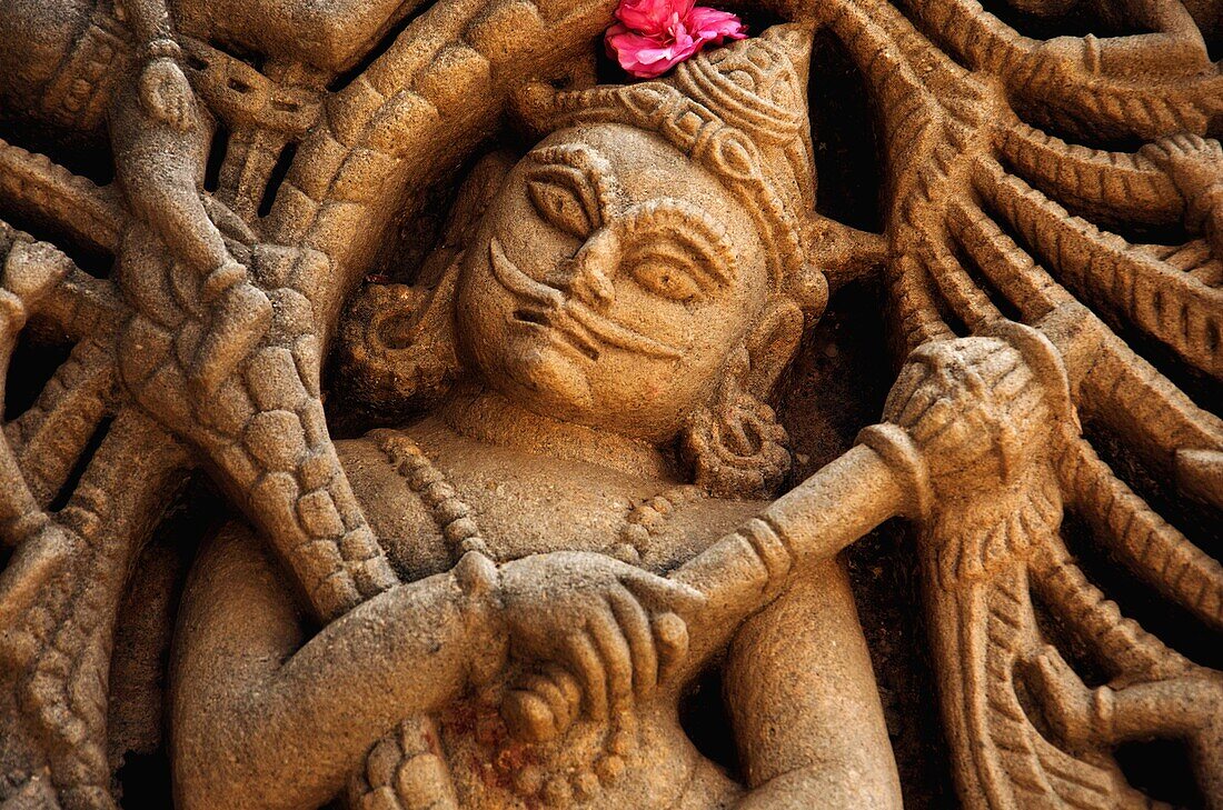Carved idol on the outer wall, Hatkeshwar Mahadev, 17th century temple, the family deity of Nagar Brahmins. Vadnagar, Gujarat, India.
