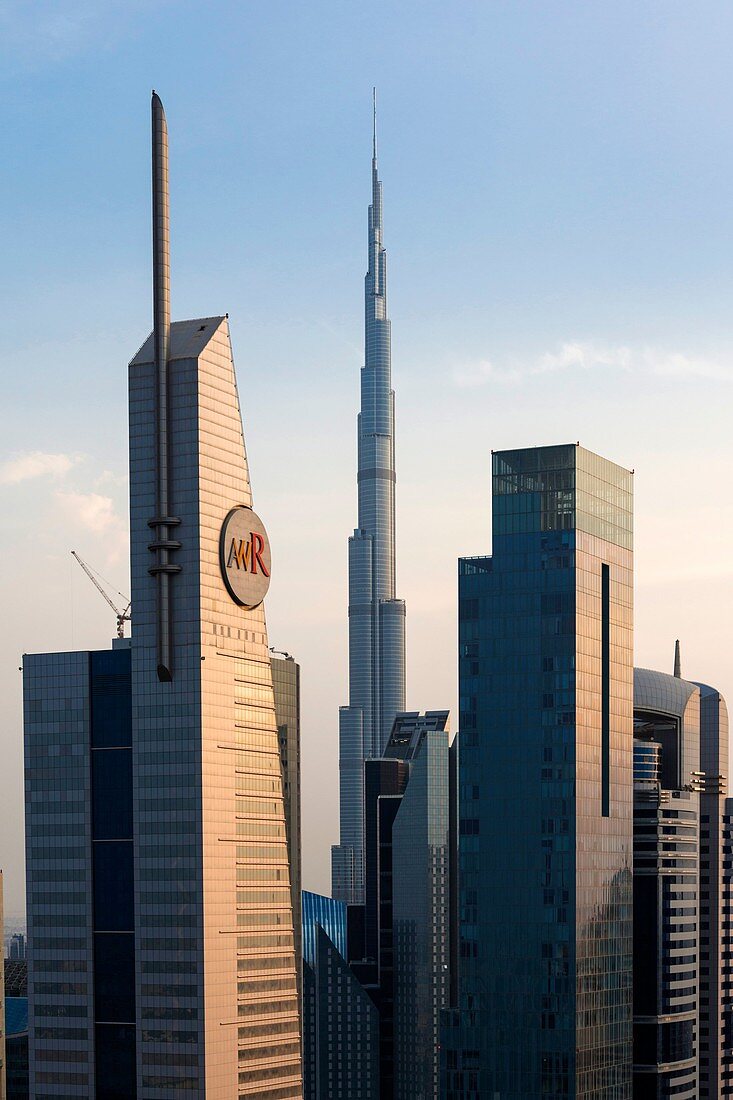 UAE, Dubai, Downtown Dubai, high rise buildings along Sheikh Zayed Road, elevated view, dusk.