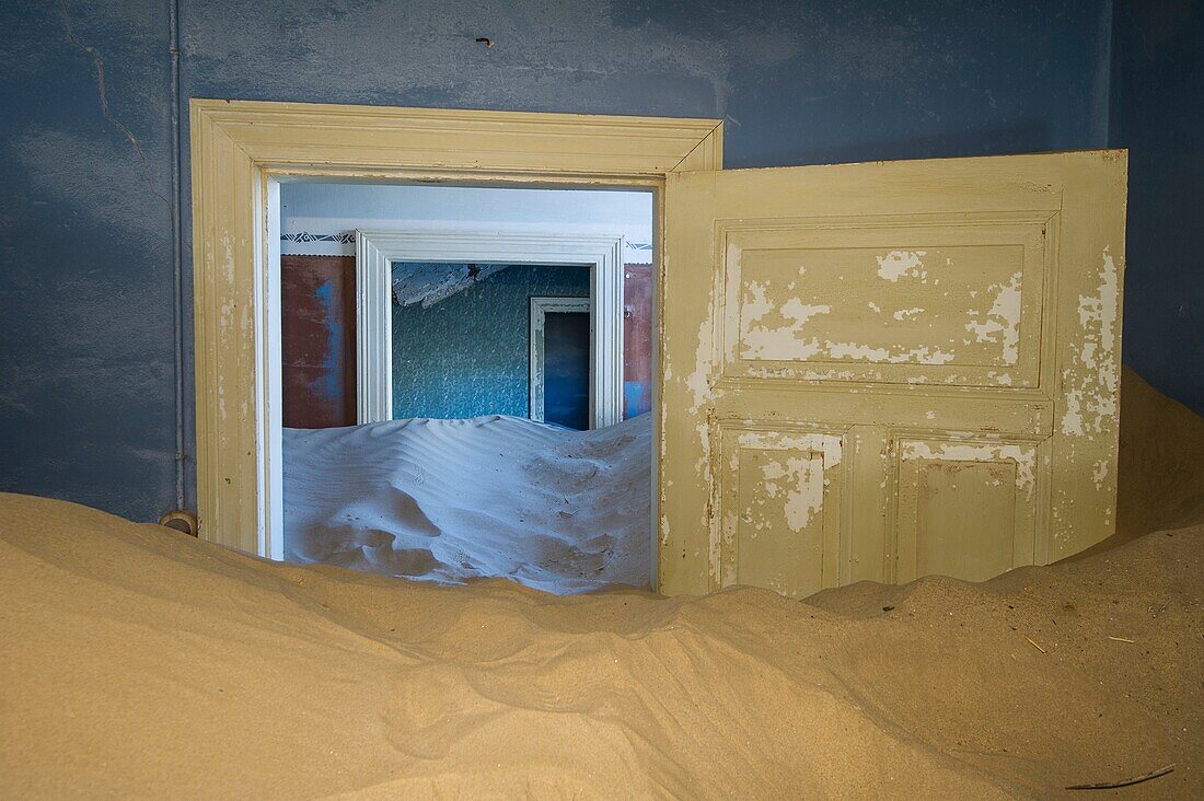 Kolmanskop, Southern Namibia, Africa. Old abandoned mining town's houses with sand.