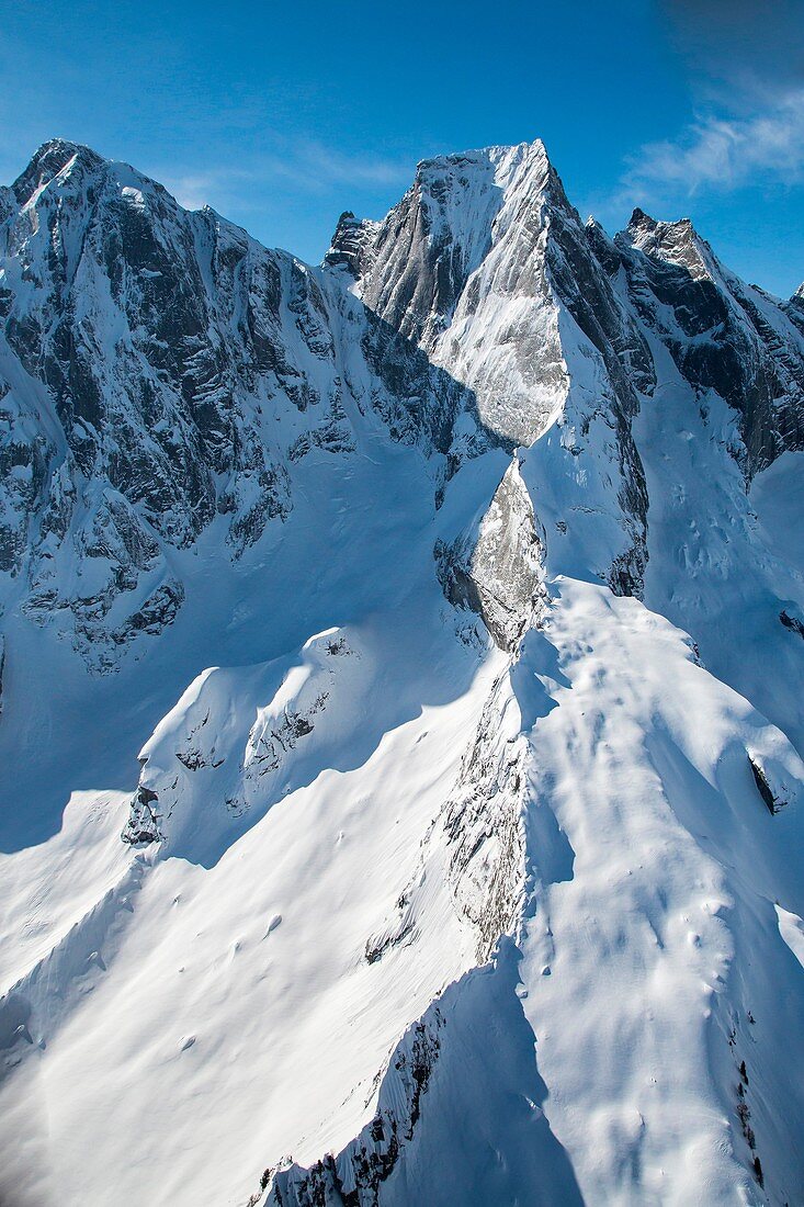 Aerial view of Spigolo Badile in winter. Val Bondasca, Val Bregaglia, Canton of Grisons Switzerland Europe.