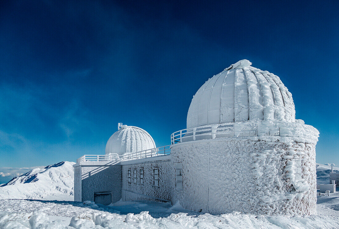 Astronomical observatory during an ice and wind storm, Campo Imperatore, L'Aquila province, Abruzzo, Italy, Europe