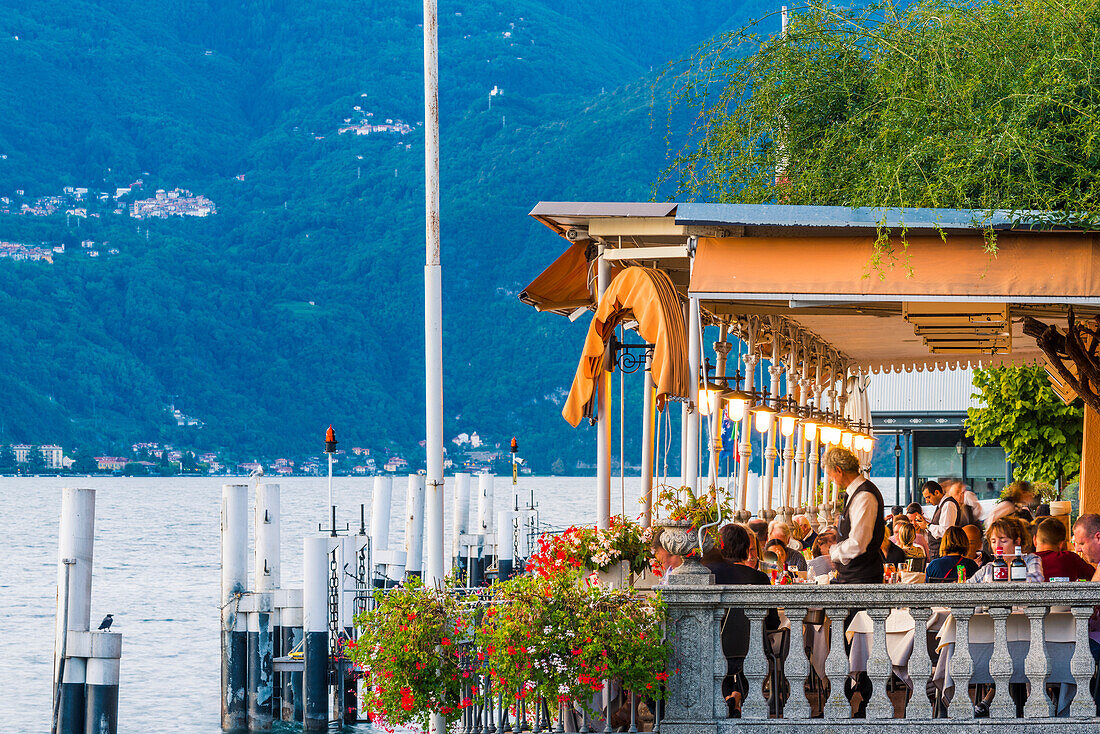 Bellagio, lake Como, Como district, Lombardy, Italy, Tourists eating out