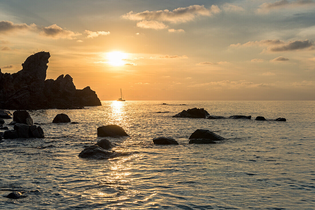 Zambrone, province of Vibo Valentia, Calabria, Italy, Europe. Sunset on the beach Lion's rock