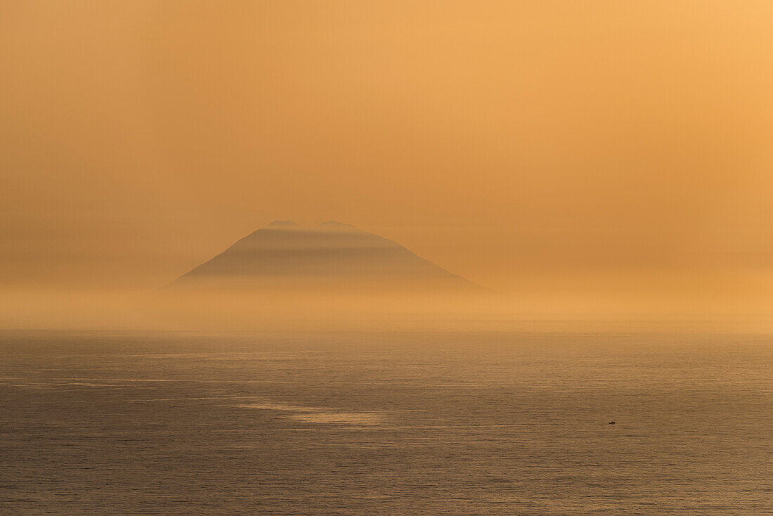 Zambrone, province of Vibo Valentia, Calabria, Italy, Europe, Sunset in Zambrone with a view of the Stromboli volcano