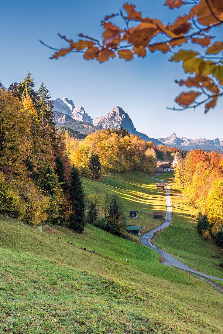 Wamberg, Garmisch-Partenkirchen, Bavaria, Germany. The little Wamberg village with the Mount Zugspitze and the Mount Waxenstein
