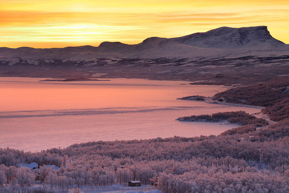 Sunrise on the snowy landscape, Bjorkliden, Abisko, Kiruna Municipality, Norrbotten County, Lapland, Sweden