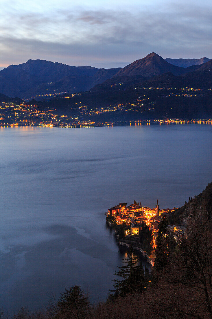 Italy, Lombardy, provence of Lecco, Como lake of Varenna village by night, in the background Menaggio village of Crocione mountain