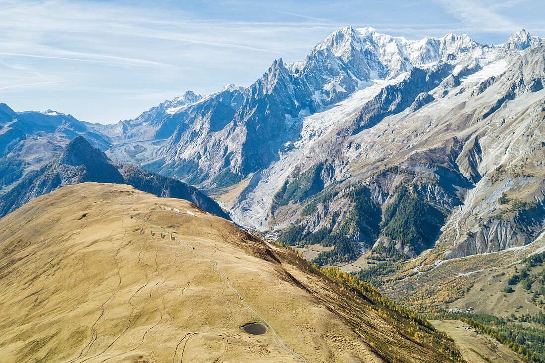 Aerial view of little lake on Mont de la Saxe and Mont Blanc in autumn, Courmayeur, Aosta Valley, Italy, Europe